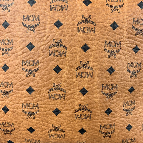 Pochette / pochette en cuir monogramme beige et noir MCM