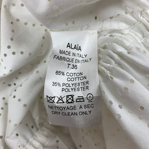 ALAIA Talla 4 Blusa perforada con corte láser de algodón / poliéster blanco