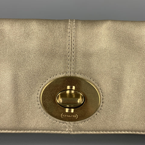 COACH Pochette en cuir doré