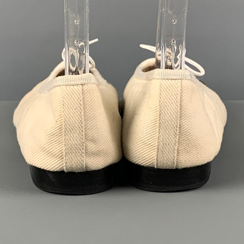 CHANEL Size 5.5 Cream Black Denim Ballet Flats