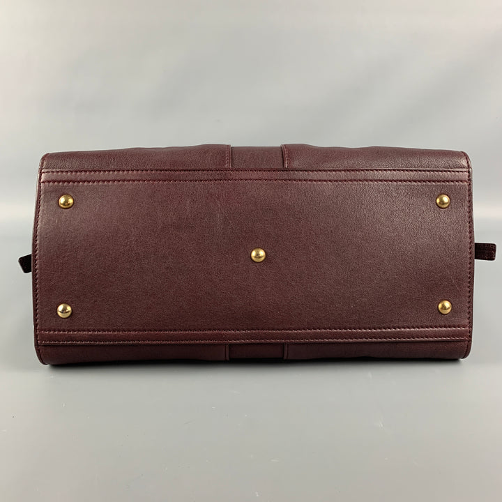 YVES SAINT LAURENT 2012 CABAS Bolso de cuero color burdeos con herrajes dorados