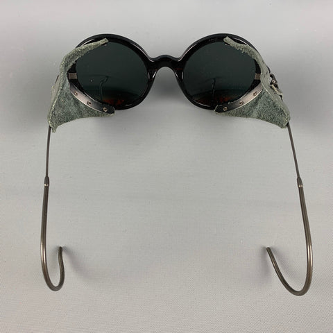 Lunettes de soleil en métal vert noir