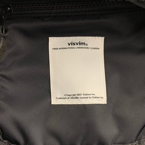 Mochila balística de nailon de 20 L con ribete de ante y materiales mixtos en negro VISVIM