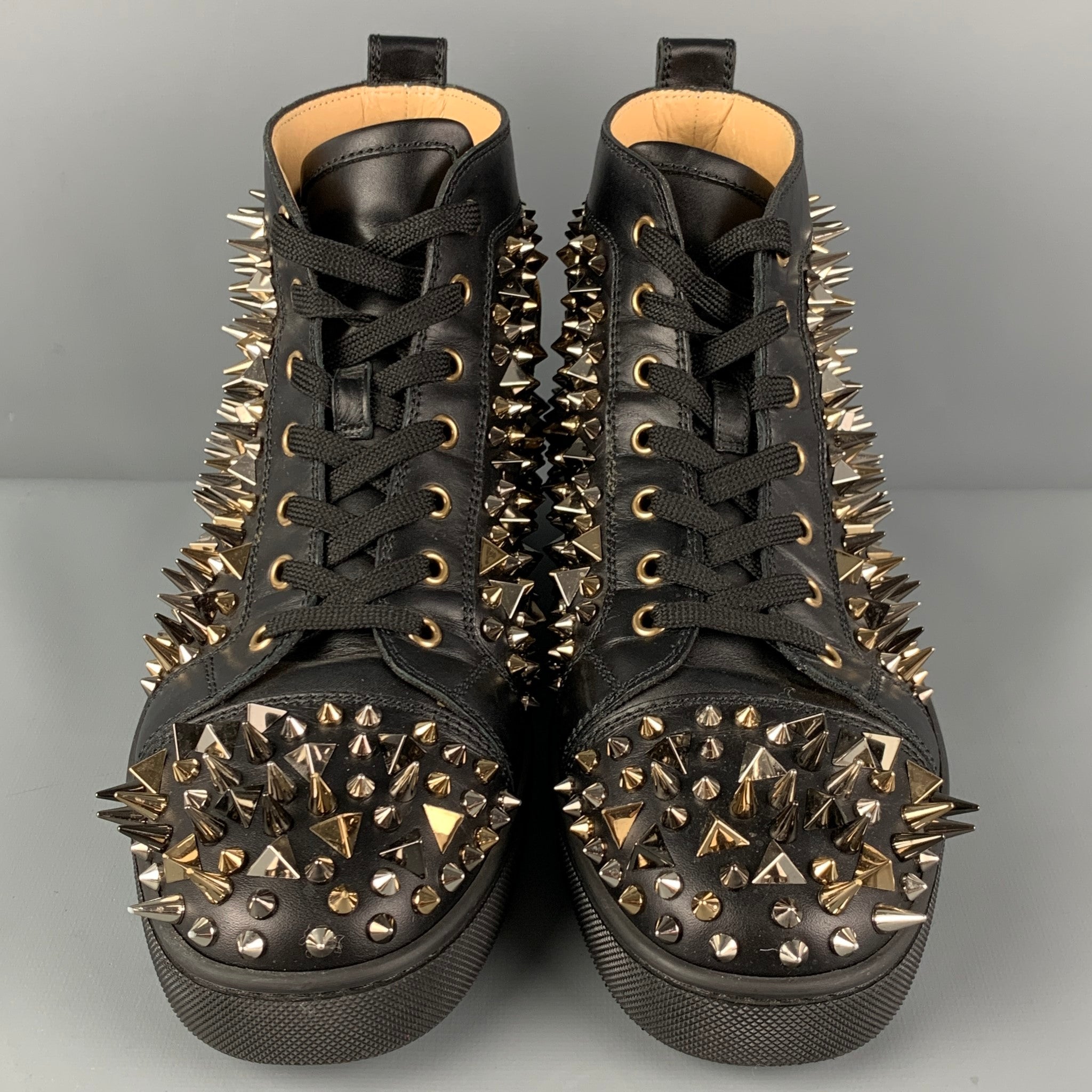 Christian louboutin black and gold outlet sneakers