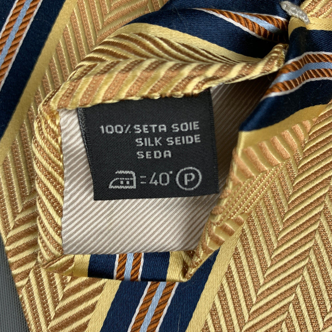 ERMENEGILDO ZEGNA Corbata de seda con rayas diagonales en amarillo marino y azul marino