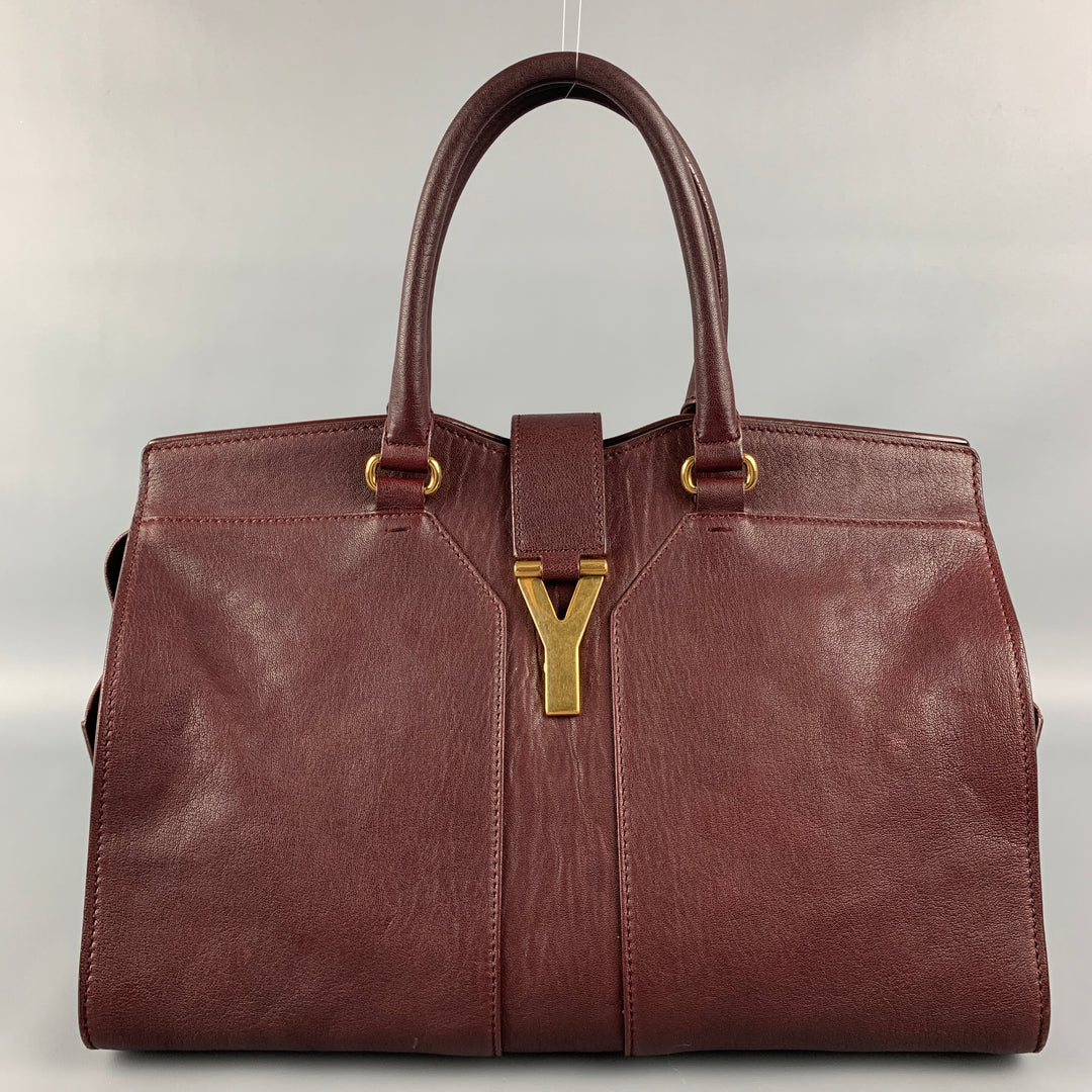 YVES SAINT LAURENT 2012 CABAS Bolso de cuero color burdeos con herrajes dorados