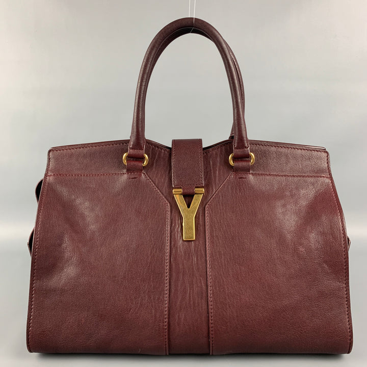 YVES SAINT LAURENT 2012 CABAS Bolso de cuero color burdeos con herrajes dorados