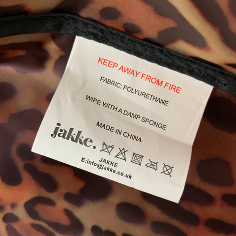 JAKKE Talla M Chubasquero de poliuretano con estampado animal, color tostado, negro y marrón