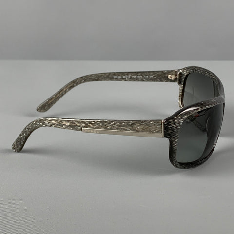 Lunettes de soleil PRADA en acétate gris scintillant