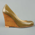 CHRISTIAN LOUBOUTIN Size 6.5 Olive Green Leather Stacked Wedge Pumps CHRISTIAN LOUBOUTIN