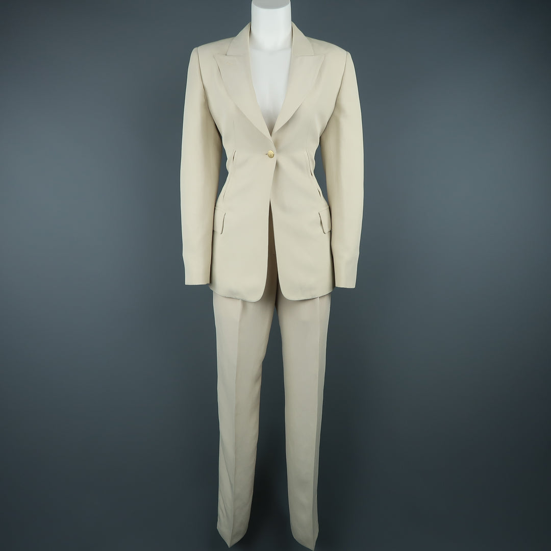 https://suigenerisconsignment.com/cdn/shop/products/CLAUDE-MONTANA-Size-8-Beige-Peak-Lapel-Single-Button--Pant-Suit_88122A.jpg?v=1555548362&width=1080