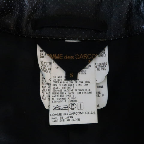 COMME des GARCONS S Blazer en simili cuir perforé noir à revers cranté 