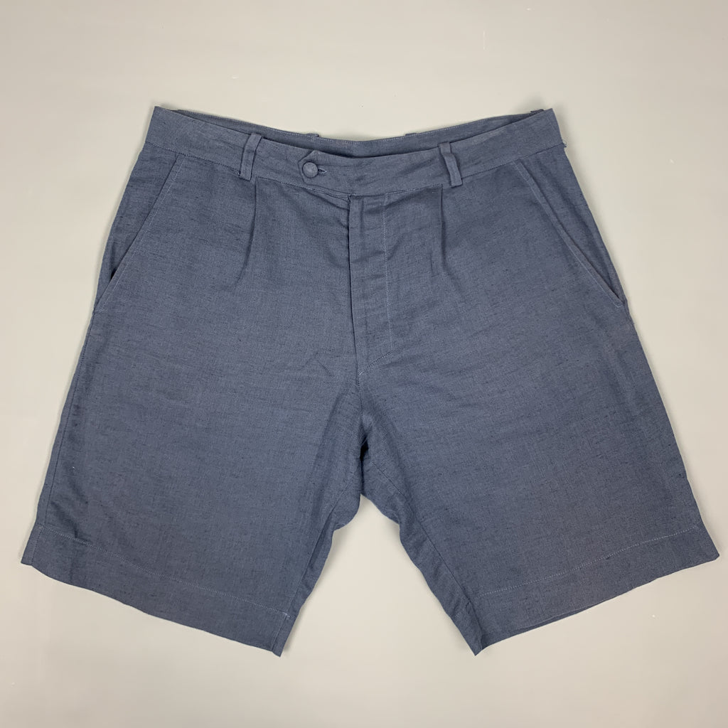 https://suigenerisconsignment.com/cdn/shop/products/LA-PERLA-Size-S-Navy-Sheer-Linen--Cotton-Pleated-Zip-Fly-Shorts_88234A_1024x1024.jpg?v=1558040942