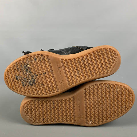 ISABEL MARANT Zapatillas de deporte con cuña perforada de cuero negro talla 7