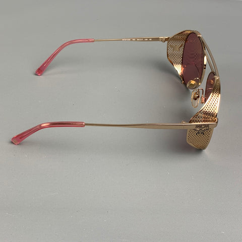 Lunettes de soleil en métal rose doré MCM