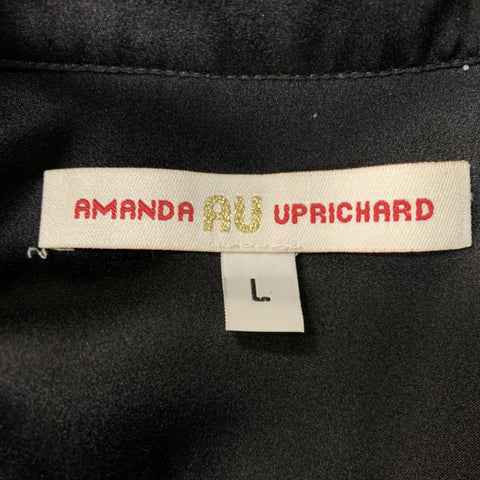 AMANDA UPRICHARD Talla L Blusa negra con cuello en V y volantes