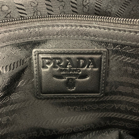 Sac messager à bandoulière en nylon et cuir noir PRADA