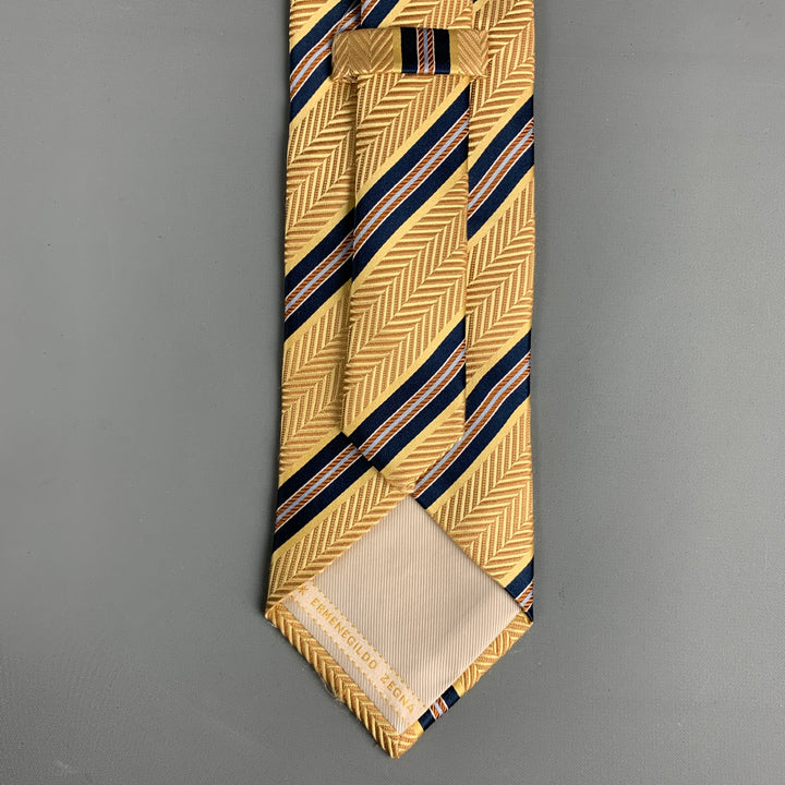 ERMENEGILDO ZEGNA Corbata de seda con rayas diagonales en amarillo marino y azul marino