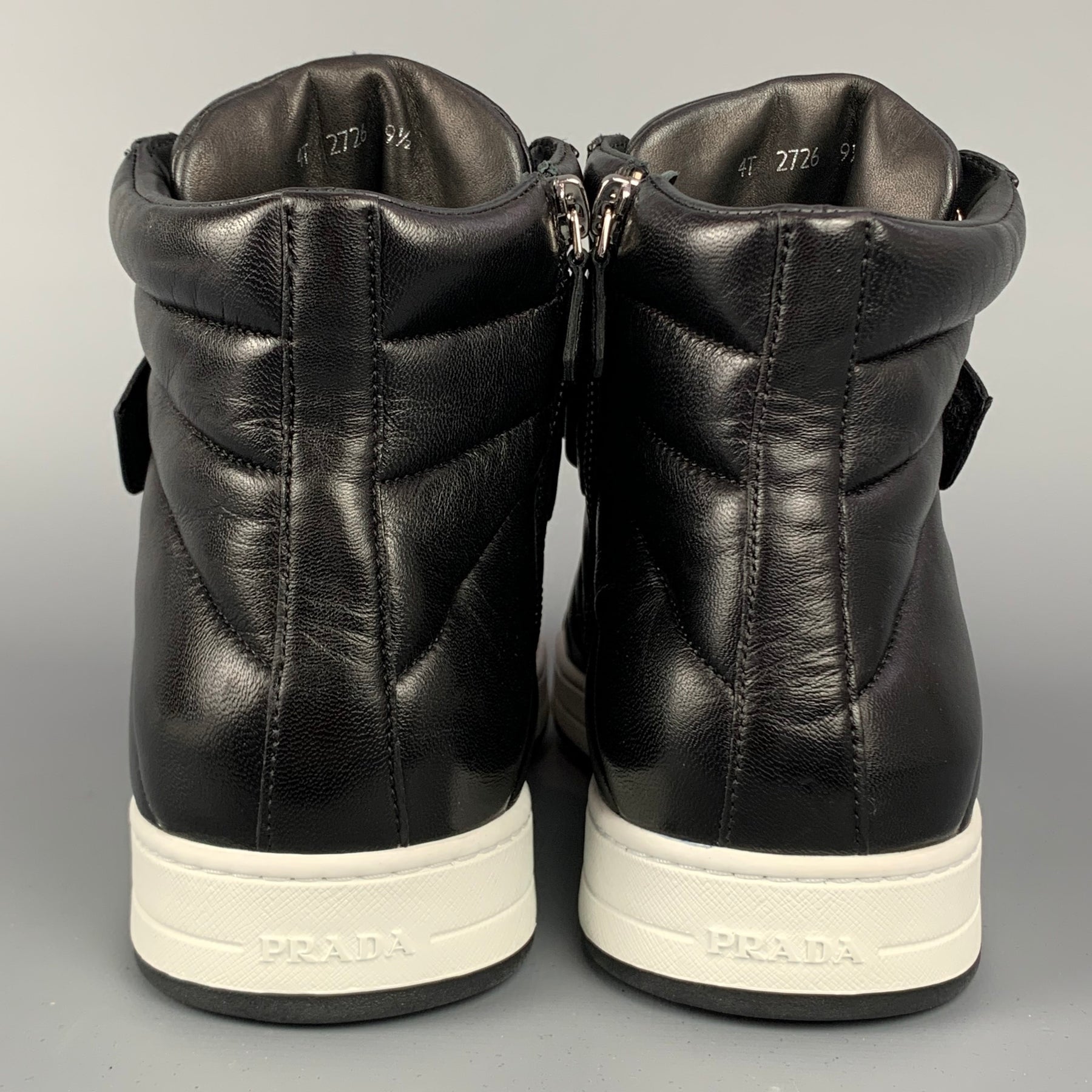 PRADA Size 10.5 Black Quilted Leather High Top Sneakers