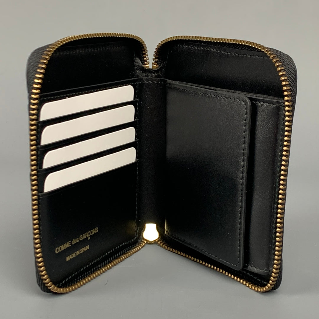 COMME des GARCONS Black Embossed Leather Wallet