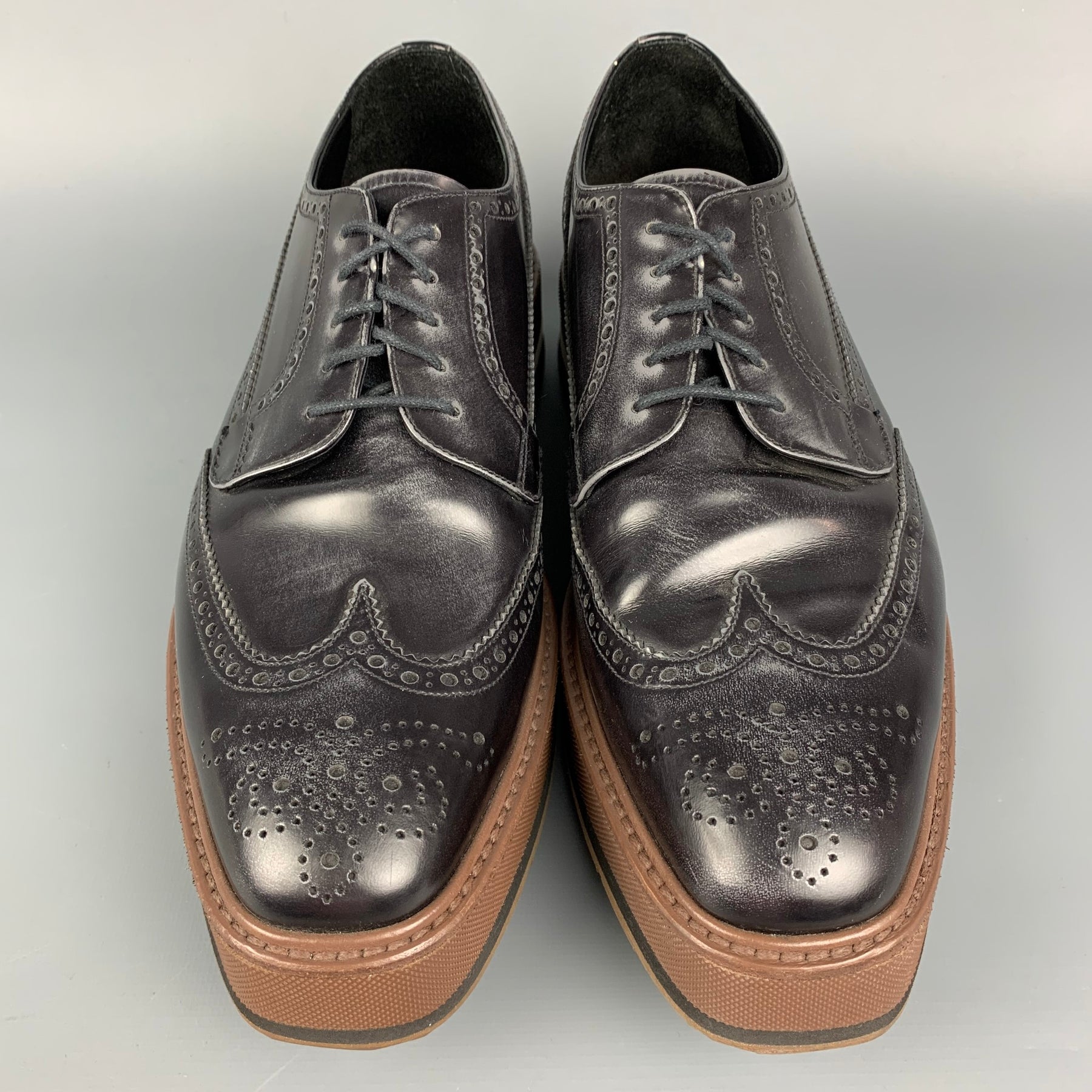 PRADA Size 8.5 Black & Brown Perforated Leather Platform