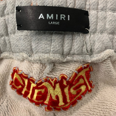 AMIRI Taille L Orange Noir Applique Étoiles Pantalon de survêtement en coton - Pantalons décontractés