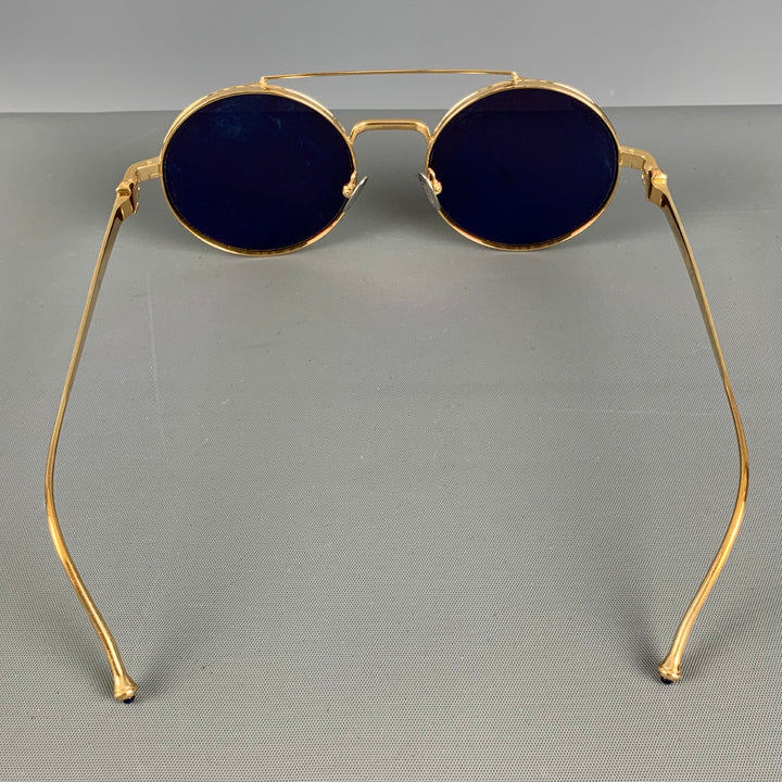 Gafas de sol CARTIER de titanio dorado