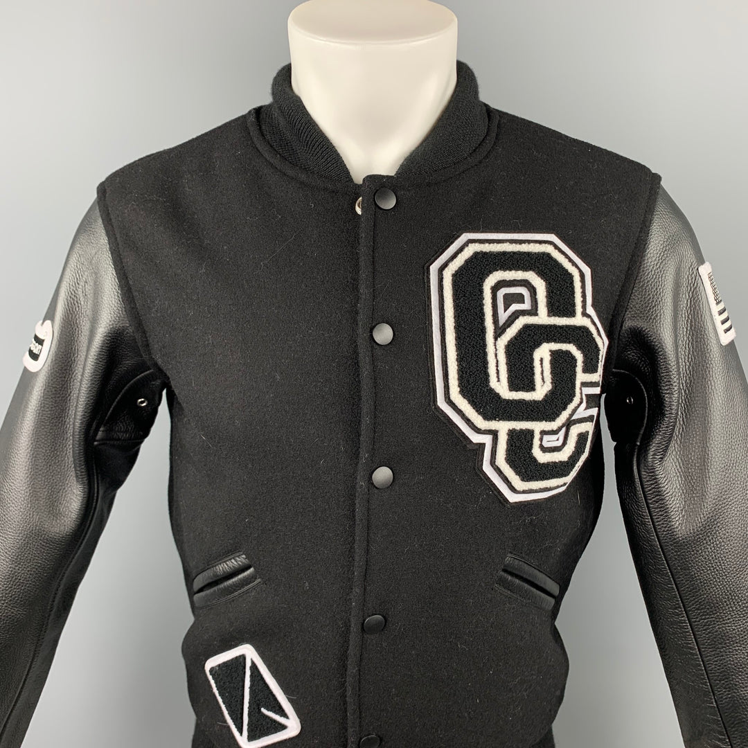 CÉRÉMONIE D’OUVERTURE Taille M Veste Varsity à manches en cuir de laine noire et blanche