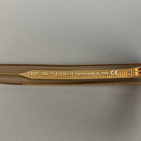 CUTLER AND GROSS Clear Gold Acetate Sunglasses