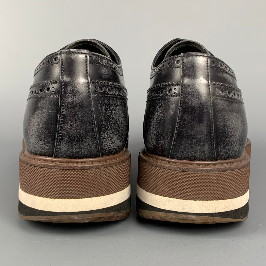 PRADA Taille 10.5 Chaussures à lacets en cuir perforé noir et marron