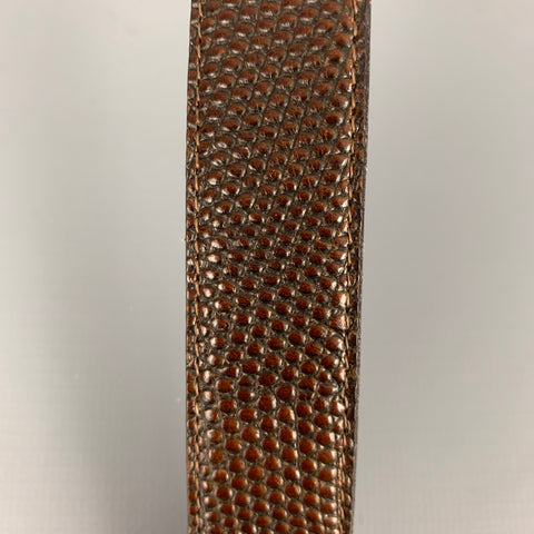 Bretelles VINTAGE en cuir gaufré marron