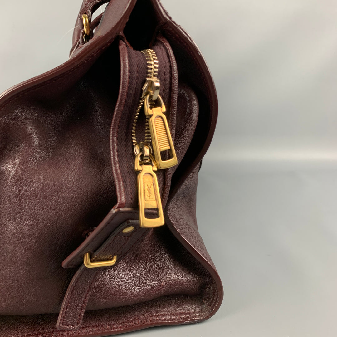 YVES SAINT LAURENT 2012 CABAS Bolso de cuero color burdeos con herrajes dorados