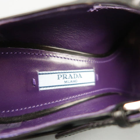 PRADA Talla 8.5 Zapatos Mary Jane con plataforma bañada en caucho gris y cuero negro