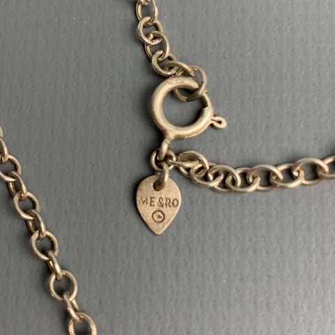ME&RO Sterling Silver Engraved Tooth Necklace
