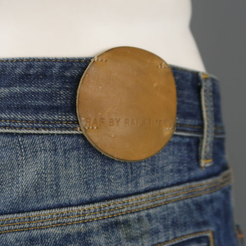 RAF by RAF SIMONS Size 34 Indigo Distressed Denim Button Fly Jeans