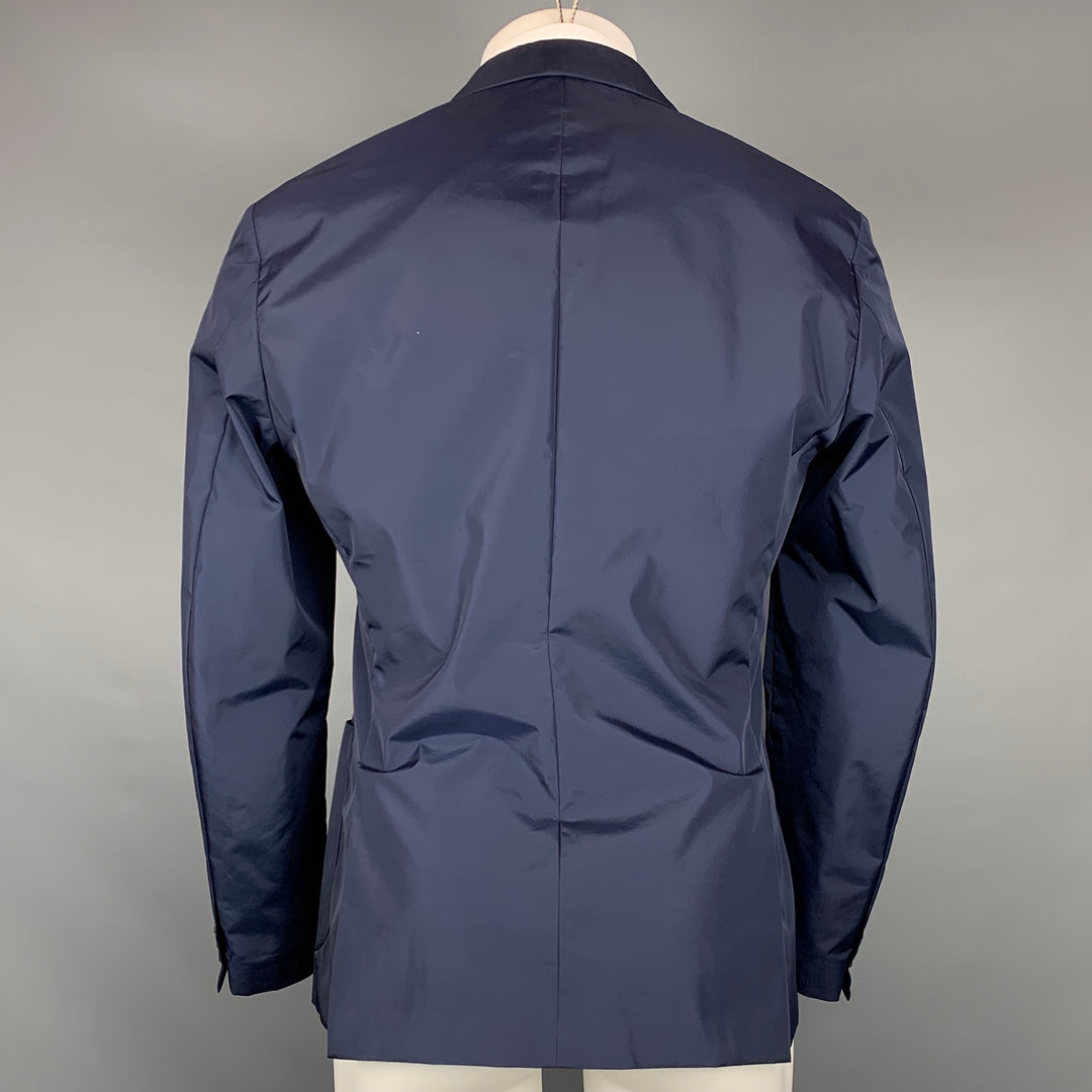 PRADA Taille 40 Manteau de sport à revers cranté en nylon / polyester bleu marine