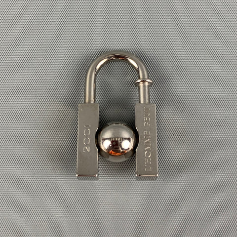 HERMES Silver Metal Bag L'HOMME PEUT EMBELLIR LA TERRE 2001 Charm