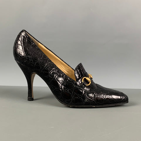 GUCCI Talla 7.5 Zapatos de tacón con punta en relieve de cuero dorado negro