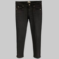 A pair of black cotton slim jeans with a zip fly closure and button details on the waist.