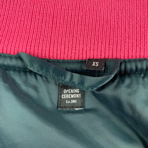 CÉRÉMONIE D’OUVERTURE Taille XS Veste bomber ceinturée en nylon rose