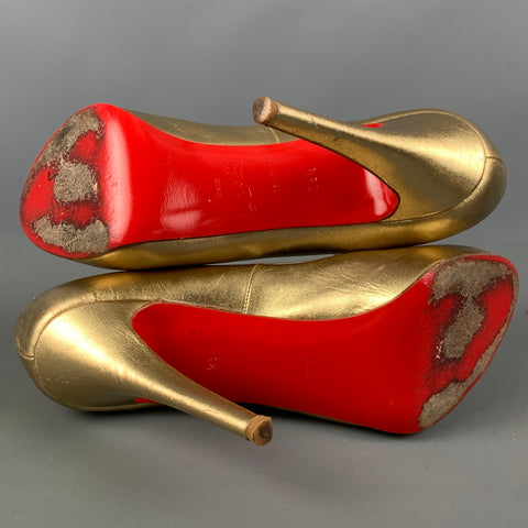 CHRISTIAN LOUBOUTIN Taille 6,5 Escarpins à bout ouvert en cuir doré