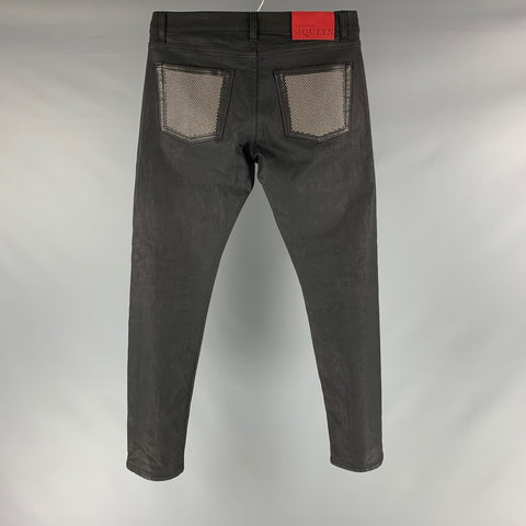 ALEXANDER MCQUEEN Taille 32 Jean en denim enduit clouté noir avec braguette boutonnée