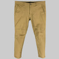 THEORY khaki casual pants made of cotton and polyurethane, displayed on a hanger, showing a straight leg and slim fit design with knee panels.