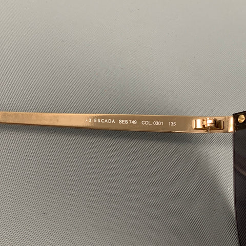 Lunettes de soleil ESCADA en métal noir doré