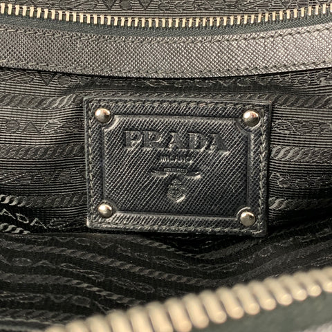Sacs de sport en nylon avec garniture en cuir clouté noir PRADA