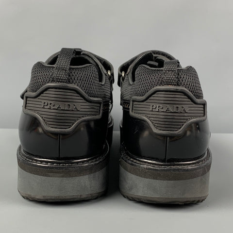 PRADA Size 11 Black Perforated Leather Wingtip Loafers
