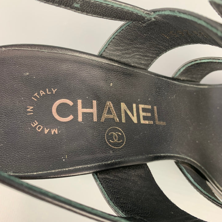 CHANEL Size 6 Black & Silver Leather Turn Lock Logo Chunky Heel Sandals