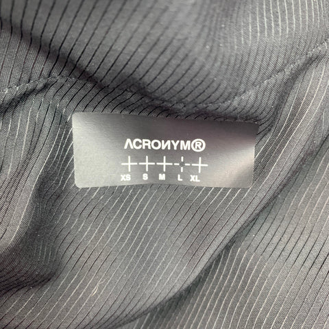 ACRONYM Pantalones cargo informales color negro liso de poliamida y elastano Talla L