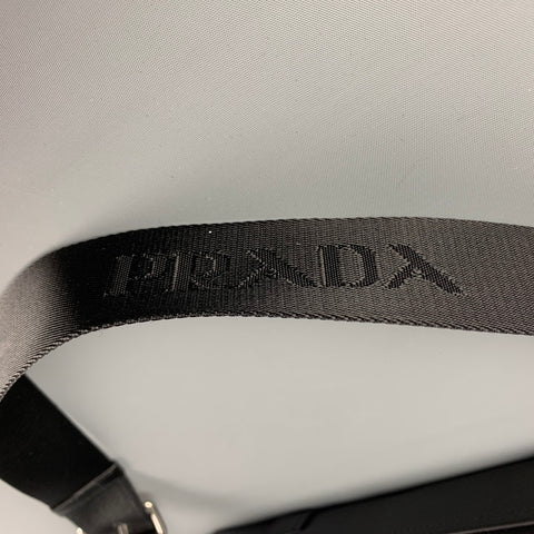Sac messager à bandoulière en nylon et cuir noir PRADA