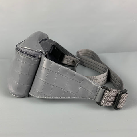 Riñonera LONGCHAMP de piel repujada gris